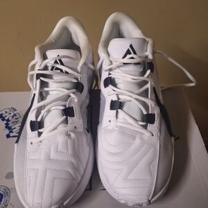 White Athletic Sneakers with Black Accents Nike Zoom Freak 5